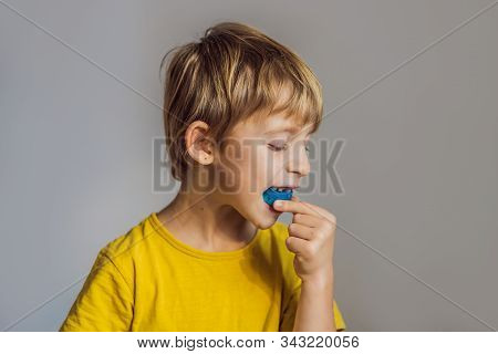 Six-year Old Boy Shows Myofunctional Trainer. Helps Equalize The Growing Teeth And Correct Bite, Dev