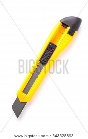 The Yellow Stationery Knife Isolated On White Background