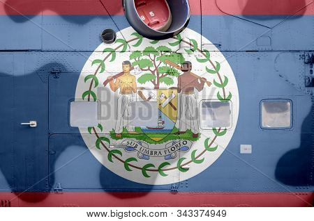 Belize Flag Depicted On Side Part Of Military Armored Helicopter Closeup. Army Forces Aircraft Conce