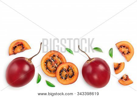 Fresh Tamarillo Fruit With Leaves Isolated On White Background With Copy Space For Your Text. Top Vi