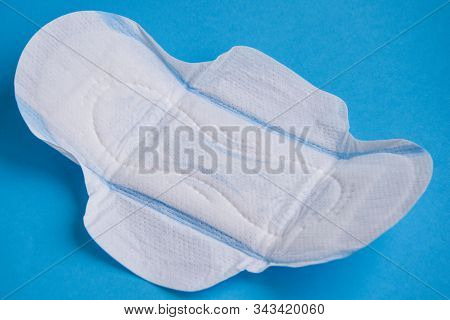 Menstruation Sanitary Pad For Woman Hygiene Protection. Critical Days. Medical Conception On The Blu