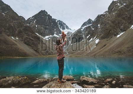 Father Hiking With Baby Travel Family Lifestyle Adventure Vacations With Child In Mountains Blue Lak