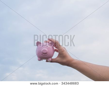 Pink Piggy Bank On The Blue Sky With Cloud Background, Saving Money For Future Plan And Retirement F