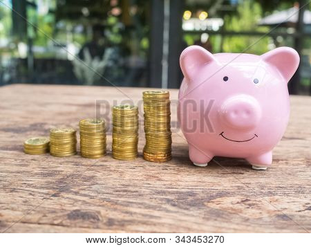 Pink Piggy Bank With 
Gold Coins Pile Growth Graph, Saving Money For Future Investment Plan And Reti