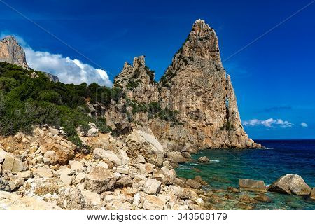 Pedra Longa In Baunei - Beautiful Rocky Beach In Sardinia. Beautiful Weather And Beautiful Beach In 