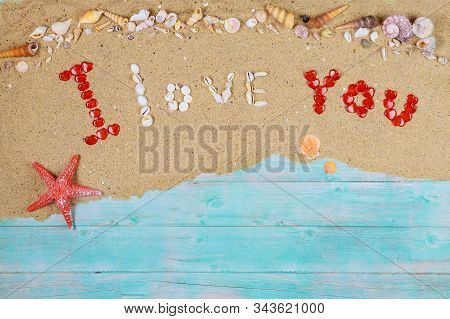 I Love You Taxt Made From Sea Shells With Red Starfish. Valentines Day Concept.