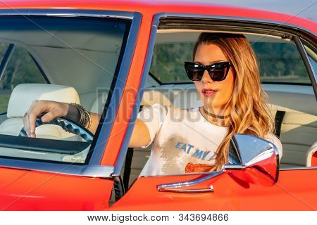 July 29, 2019 - Mooresville, North Carolina, USA: NASCAR Wives cast member, Ashley Busch, poses with her husband, Kurt Busch, for a photoshoot at Mooresville Dragway in Mooresville, NC