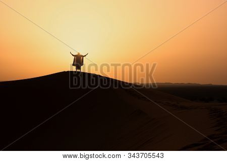 The Beauty Of The Sand Dunes In The Sahara Desert In Morocco. The Sahara Desert Is The Largest Hot D