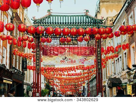 London, Uk/europe; 20/12/2019: Chinese Gate And Red Lanterns In Chinatown In The District Of Soho In