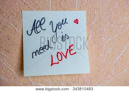 Text All You Need Is Love On Post It. Writing On Colorful Sticky Note. Bucharest, Romania, 2020.