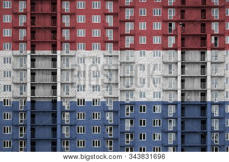 Netherlands Flag Depicted In Paint Colors On Multi-storey Residental Building Under Construction. Te