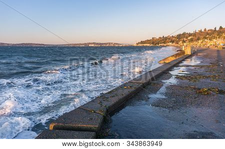 Waves Sbreak On The Shore At Alki Beach In West Seattle, Washington.