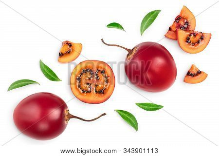 Fresh Tamarillo Fruit With Leaves Isolated On White Background. Top View. Flat Lay