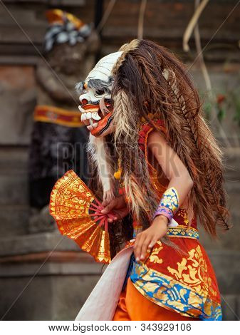 Dancer In Demon Rangda Traditional Mask - Evil Spirit Of Bali Isalnd. Temple Ritual Dance At Ceremon