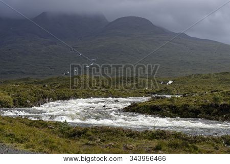 River Sligachan In Spate With Cuillin Hills, Isle Of Skye, Western Isles; Scotland