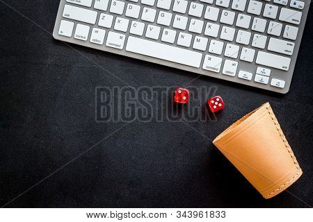Hazard Gemes Online Concept. Dices Near Keyboard On Black Background Top-down Copy Space