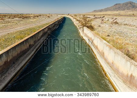 Water Flowing In An Irrigation Canal In Kyrgyzstan, Irrigation Canal Chuy Province