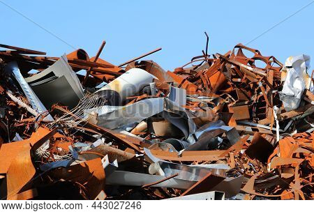 Many Rusty Ferrous Scrap In A Controlled Landfill Of A Foundry
