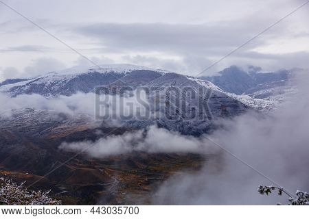 Panoramic View From The Gunib Village, Dagestan, Russia. Snow-capped Mountains And Autumn Fields. Be