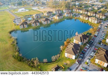 Aerial Autumn Scene The Denham Springs Small Town Apartment Complex Near Pond In Louisiana Us