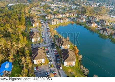 Autumn Season Residential Street, Apartment Complex Near Pond From Above Small Town In Denham Spring