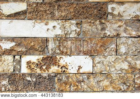 Wall Made Of Natural Rocks As A Background
