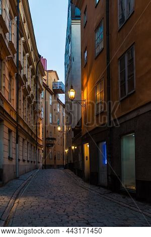 Perspective View Of Historical Buildings On The Tyska Skolgrand Alley At Twilight, Stockholm, Sweden