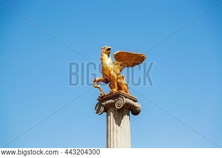 Kerch, Russia - June 29, 2019: Symbol Of The City Of Kerch. Stela With Golden Griffin On Taurus Squa