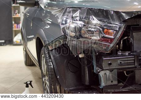 Installation Of A Protective Paint And Varnish Transparent Film On The Car. Ppf Polyurethane Film To