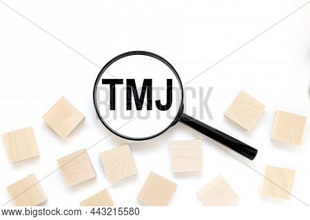 Tmj. Text In Nalupe On White Background