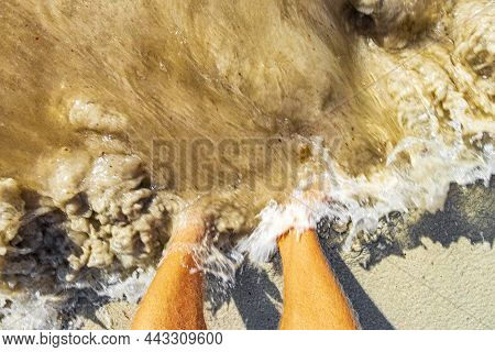 Feet In Water And Sand Beach Playa Del Carmen Mexico.