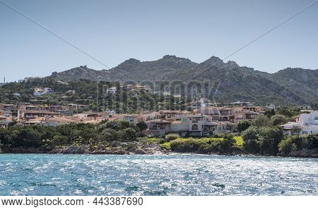 Skyline Of Ht Exclusive Village Of Porto Servo On Sradinia Island Italy With The Mountains As Backgr