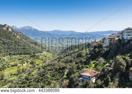 The Mountains In The Centre Of Sardinia Island, With The Village Of Orgosolo On The Right And The Sm