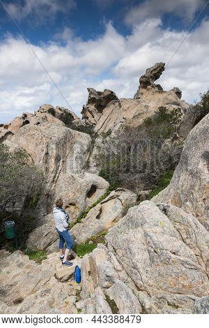 Palau,italy,09-apr-2018:adult Woman At The Big Rocks And Beautifull Nature Of The Capo Dorso In Sard