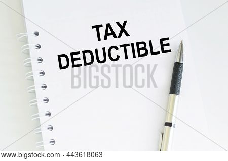 Writing Text Showing Tax Deductions. Business Concept For Finance Incoming Tax Money Deduction Writt