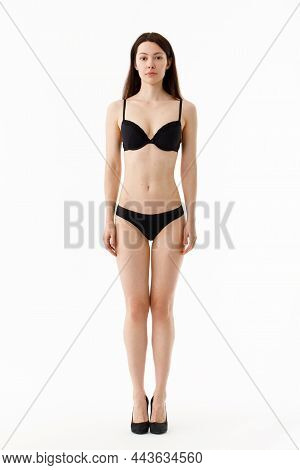 Model Tests. Snap Models Back View, Beautiful Brunette Woman In Underwear, Isolated On White.