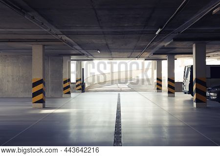 Open Car Parking Garage With Ramp On Sunny Day