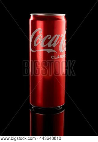 Red 330ml Can Of Coca-cola On Black Background With Beautiful Reflection. Front View. Coca-cola Clas