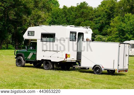 Bordeaux , Aquitaine  France - 12 15 2021 : Land Rover Defender Motorhome Cell On An All-terrain Veh
