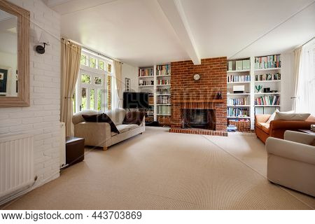 Stradishall, Suffolk, England - 16 June 2020: Lounge Living Room Interior In Traditonal Home With Fi