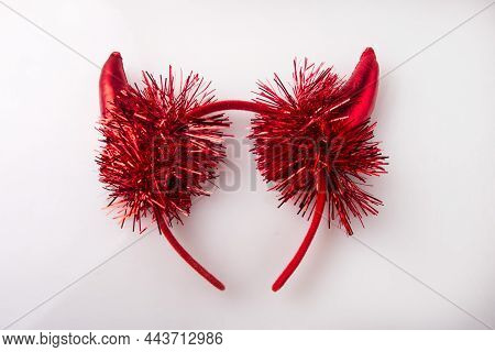 Funny Carnival Headband On The Head. Deer Antlers And Unicorn Horn