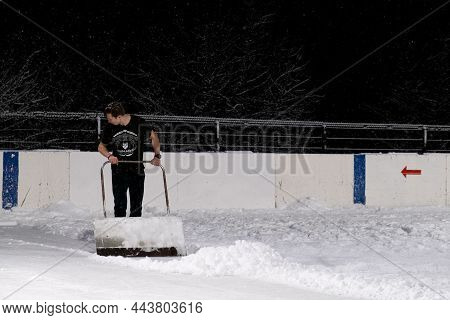 03.12.2021. Heavy Snowfall In Moscow. People With Children On An Ice Rink Near Tsaritsyno Park. High