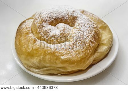 Traditional Spanish Bakery Pastry Dessert, Ensaimada. Mallorca Dessert. Balearic Islands