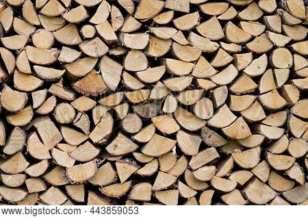 Firewood Stacked In A Pile Background Front View