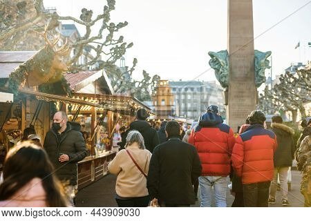 Strasbourg, France - Dec 17, 2021: Crowd Wearing Respiratory Surgical Protection Masks During The Ch