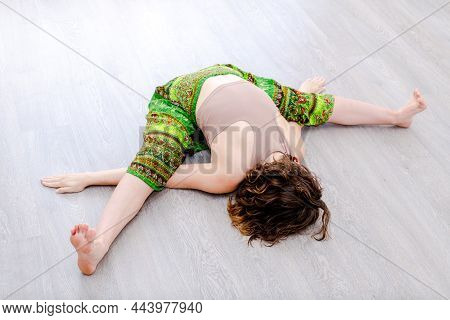 Sporty Yogi Woman Doing Fitness Exercises, Yoga Asana Kurmasana, Tortoise Posture, Turtle Pose Top V