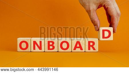 Onboard And Onboarding Symbol. The Concept Word Onboard On Wooden Cubes. Beautiful Orange Table, Ora