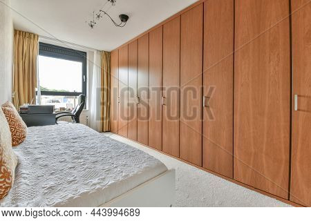 Luxurious Bedroom With A Soft Bed And An Elastic Mattress