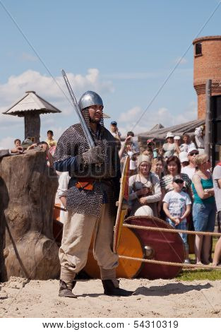 Unidentified Participant In Medieval Fight At A Historical Reenactment Festival Held In Abalak, Sibe