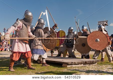 Medieval Fight At A Historical Reenactment Festival Held In Abalak, Siberia. Russia